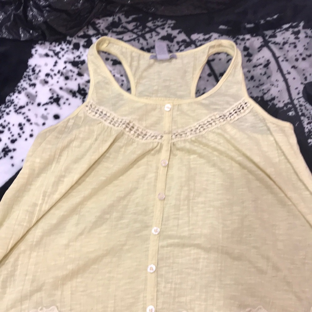 Yellow tank top.